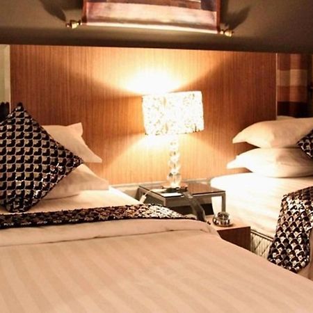 Arenaa Deluxe Hotel Malacca Værelse billede